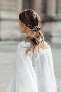 Girl wearing silk scrunchie in ponytail